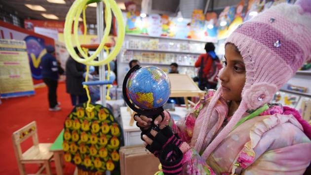 A young girl looks at a globe during the book fair. Pratibha Ray, noted Odia Author and Jnanpith Awardee was the guest of honour and Tomasz Kozlowski, Ambassador of the Delegation of the European Union to India was the special guest on the occasion. (Virendra Singh Gosain/HT PHOTO) A young girl looks at a globe during the book fair. Pratibha Ray, noted Odia Author and Jnanpith Awardee was the guest of honour and Tomasz Kozlowski, Ambassador of the Delegation of the European Union to India was the special guest on the occasion. (Virendra Singh Gosain/HT PHOTO)