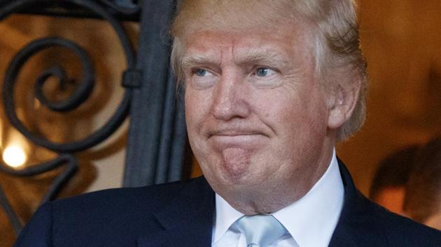 US President-elect Donald Trump talks to reporters at Mar-a-Lago in Palm Beach, Florida. (AP Photo) US President-elect Donald Trump talks to reporters at Mar-a-Lago in Palm Beach, Florida. (AP Photo)