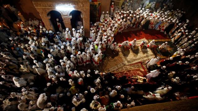 Ethiopian Orthodox choir members perform during Ethiopian Christmas Eve celebration. (Tiksa Negeri/REUTERS)