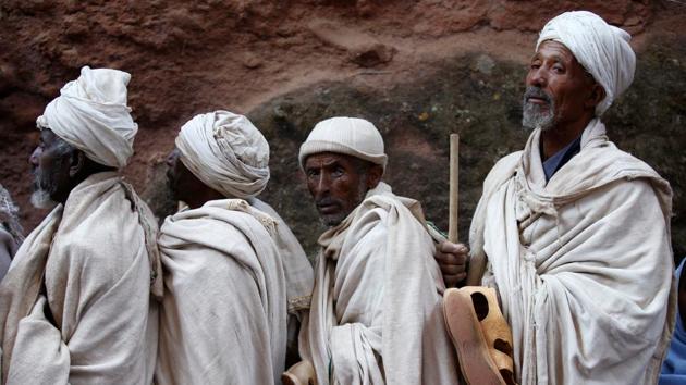 Ethiopian Orthodox faithful arrive for a morning prayer at a rock hewn church ahead of Ethiopian Christmas. (Tiksa Negeri/REUTERS)