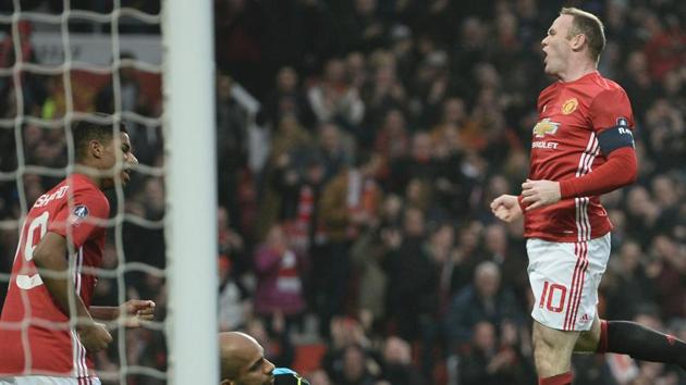 Wayne Rooney and Anthony Martial scored for Manchester United F.C. as they entered the fourth round of the FA Cup. (AFP) Wayne Rooney and Anthony Martial scored for Manchester United F.C. as they entered the fourth round of the FA Cup. (AFP)