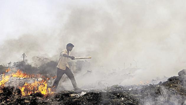 On November 23, the NGT directed the district magistrate of Gautam Budh Nagar and other local authorities to strictly act against those burning waste and causing air pollution. (Burhaan Kinu/HT File) On November 23, the NGT directed the district magistrate of Gautam Budh Nagar and other local authorities to strictly act against those burning waste and causing air pollution. (Burhaan Kinu/HT File)