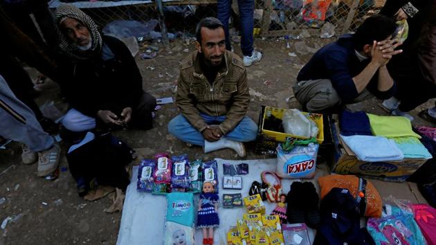 An Iraqi who fled the Islamic State stronghold of Mosul, sells products at Khazer camp, Iraq. (Reuters Photo) An Iraqi who fled the Islamic State stronghold of Mosul, sells products at Khazer camp, Iraq. (Reuters Photo)