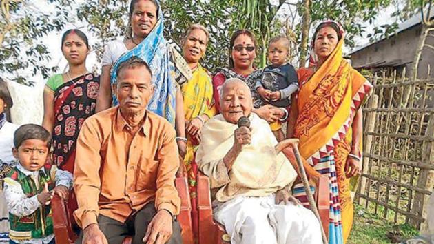 Phulti Barman (seated, in white), well over 100 years old, regales the audience with her tribal songs. (HT Photo) Phulti Barman (seated, in white), well over 100 years old, regales the audience with her tribal songs. (HT Photo)