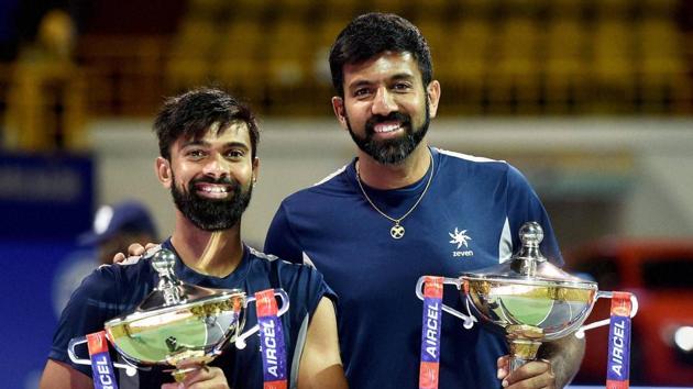 Rohan Bopanna and Jeevan Nedunchezhiyan beat Purav Raja and Divij Sharan 6-3, 6-4 to claim the Chennai Open doubles title.(PTI)