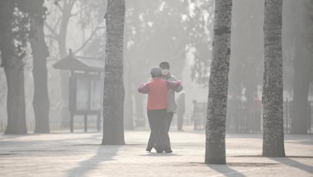 People exercise in a park on a hazy day in Beijing, China, on January 4, 2017. (Reuters) People exercise in a park on a hazy day in Beijing, China, on January 4, 2017. (Reuters)