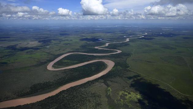 An aerial view of the meandering Bermejo river, the limit between the Argentine provinces of Formosa (L) and Chaco, near the town of General Lucio V. Mansilla in Formosa. (AFP)