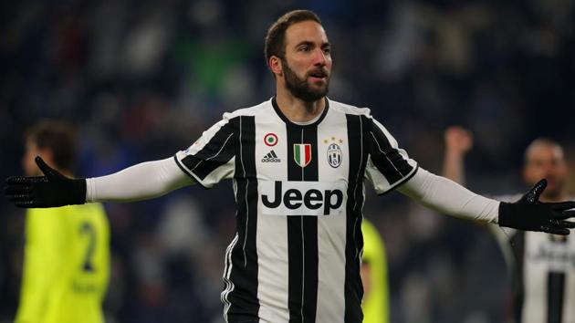 Gonzalo Higuain scored a brace as Juventus FC defeated Bologna FC 3-0 to set a Serie A record of 26 consecutive home wins. (AFP) Gonzalo Higuain scored a brace as Juventus FC defeated Bologna FC 3-0 to set a Serie A record of 26 consecutive home wins. (AFP)