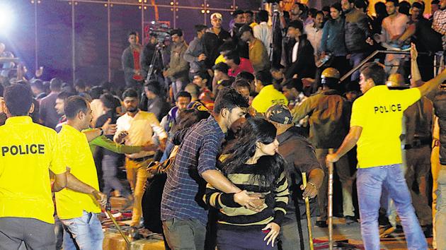 Police personnel manage the crowd during New Year's Eve celebrations in Bengaluru on January 1, 2017.(AFP file photo)