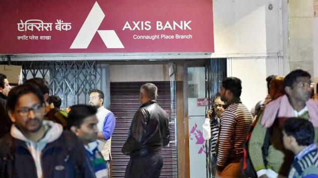 IT officials raid an Axis Bank branch at Connaught Place in New Delhi on Dec 15. (PTI File Photo) IT officials raid an Axis Bank branch at Connaught Place in New Delhi on Dec 15. (PTI File Photo)