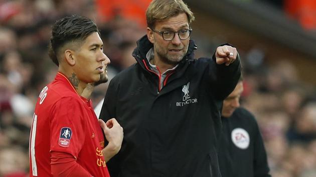 Liverpool manager Juergen Klopp gives instruction to substitute Roberto Firmino during the FA Cup third round match against Plymouth on Sunday. (REUTERS) Liverpool manager Juergen Klopp gives instruction to substitute Roberto Firmino during the FA Cup third round match against Plymouth on Sunday. (REUTERS)