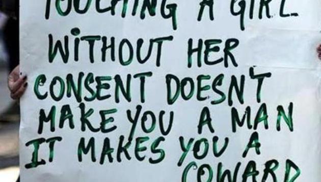 A protester holding a placard protesting sexual harassment of women.(HT File Photo) A protester holding a placard protesting sexual harassment of women.(HT File Photo)