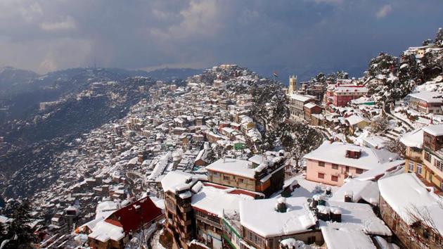 Snow lies on rooftops in Shimla, after heavy winter showers swept across South Asia. (AFP) 