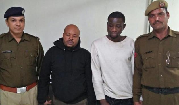 Two Nigerian nationals held by Gurgaon police in an online fraud case have said during questioning that a large number of foreign nationals are staying at Tughlakabad Extension in New Delhi without valid passports and visas. (HT Photo) Two Nigerian nationals held by Gurgaon police in an online fraud case have said during questioning that a large number of foreign nationals are staying at Tughlakabad Extension in New Delhi without valid passports and visas. (HT Photo)