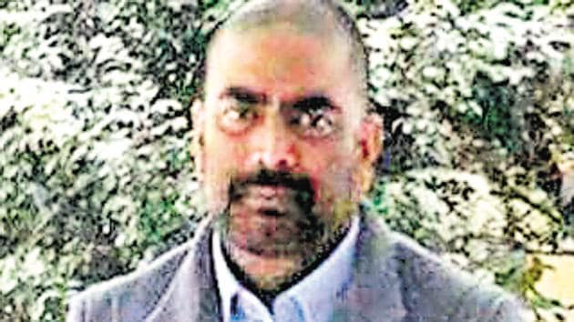 The photo that went viral on the social media shows RJD leader Md Shahabuddin in a tonsured avatar sans glasses, wearing a coat. The photo that went viral on the social media shows RJD leader Md Shahabuddin in a tonsured avatar sans glasses, wearing a coat.