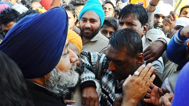 SAD chief Sukhbir Singh Badal meeting people at a village in Jalalabad on Monday. (HT Photo) SAD chief Sukhbir Singh Badal meeting people at a village in Jalalabad on Monday. (HT Photo)