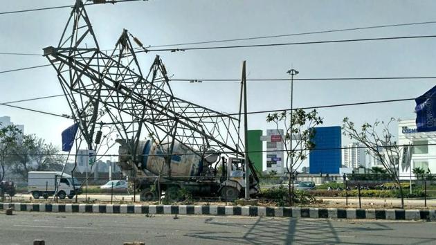 A concrete mixer truck crashed into a high-tension electric tower on the road dividing sectors 65 and 66 on Monday night. A concrete mixer truck crashed into a high-tension electric tower on the road dividing sectors 65 and 66 on Monday night.