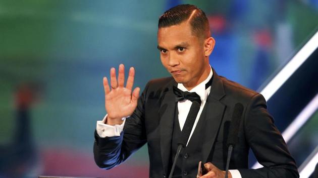Mohd Faiz Subri of Malaysia receives the award won the Puskas award for the best goal of the year (REUTERS)