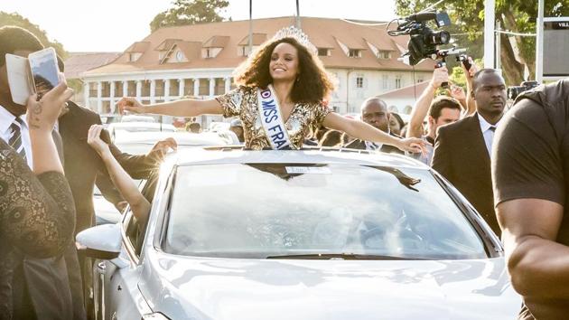 Miss Guyana 2016 and newly elected Miss France 2017 Alicia Aylies, waves to people as she parades in a car on January 9, 2017 in Cayenne. (jody amiet / AFP) Miss Guyana 2016 and newly elected Miss France 2017 Alicia Aylies, waves to people as she parades in a car on January 9, 2017 in Cayenne. (jody amiet / AFP)
