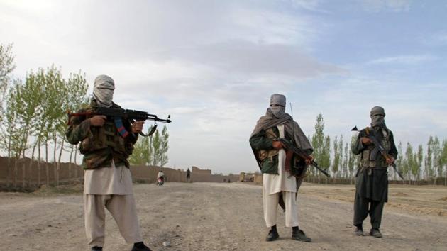Members of the Taliban stand at the site of the execution of three men in Ghazni province, Afghanistan. (Reuters File Photo) Members of the Taliban stand at the site of the execution of three men in Ghazni province, Afghanistan. (Reuters File Photo)