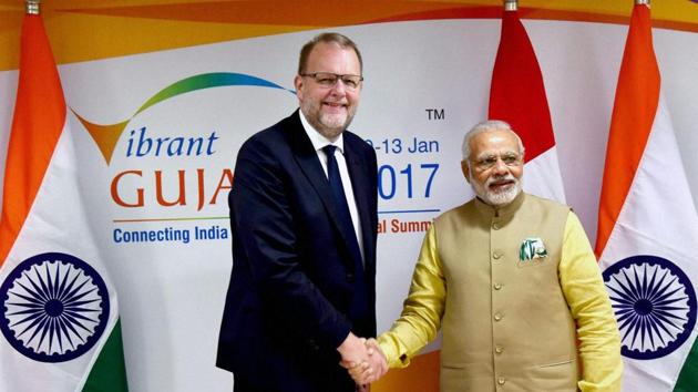 Prime Minister Narendra Modi with Lars Christian Lilleholt, minister of energy, utilities and climate, Denmark at the inauguration of Vibrant Gujarat Global Summit 2017, in Gandhinagar, Gujarat on Tuesday. (PTI) Prime Minister Narendra Modi with Lars Christian Lilleholt, minister of energy, utilities and climate, Denmark at the inauguration of Vibrant Gujarat Global Summit 2017, in Gandhinagar, Gujarat on Tuesday. (PTI)