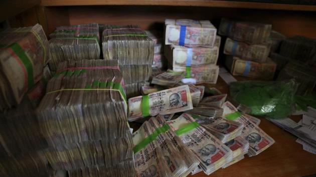 The government said Rs 3-4 lakh crore of tax-evaded income could have been deposited in banks in the 50-day window after curency recall. (AP File Photo) The government said Rs 3-4 lakh crore of tax-evaded income could have been deposited in banks in the 50-day window after curency recall. (AP File Photo)
