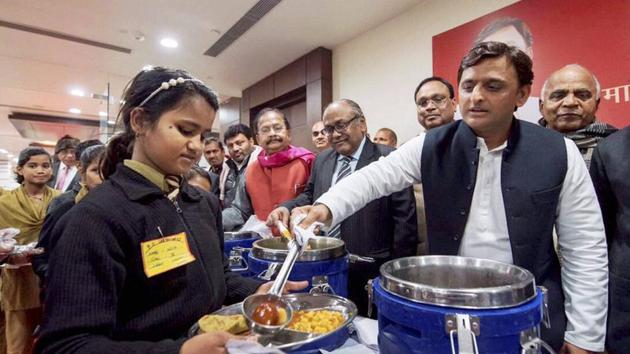 Uttar Pradesh Chief Minister Akhilesh Yadav after laying the foundation stone for 11 district level centralised kitchens operated by Akshaya Patra in Lucknow on December 26. In the weeks before the poll schedule was announced, CM Akhilesh Yadav went on a foundation stone-laying and project inauguration spree, to beat the EC’s code of conduct. (PTI) Uttar Pradesh Chief Minister Akhilesh Yadav after laying the foundation stone for 11 district level centralised kitchens operated by Akshaya Patra in Lucknow on December 26. In the weeks before the poll schedule was announced, CM Akhilesh Yadav went on a foundation stone-laying and project inauguration spree, to beat the EC’s code of conduct. (PTI)