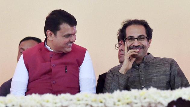 Maharashtra CM Devendra Fadnavis along with Shiv Sena President Uddhav Thackarey during the foundation stone laying ceremony of the two metro corridors and other projects, at Bandra Kurla Complex, in Mumbai on December 24.(PTI)