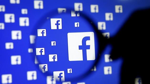 A man poses with a magnifier in front of a Facebook logo on display in this illustration taken in Sarajevo, Bosnia and Herzegovina, December 16. (Reuters) A man poses with a magnifier in front of a Facebook logo on display in this illustration taken in Sarajevo, Bosnia and Herzegovina, December 16. (Reuters)