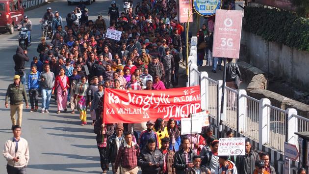 Around 500 activists and residents took the streets in Shillong after a 14-year-old girl was raped allegedly by rebel-turned-MLA Julius Kitbok Dorphang.(HT Photo)
