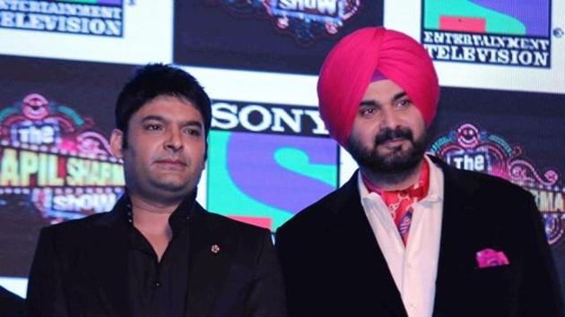 Kapil Sharma and Navjot Singh Sidhu at a promotional event . (IANS) Kapil Sharma and Navjot Singh Sidhu at a promotional event . (IANS)