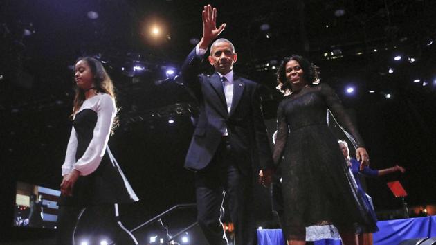 President Barack Obama waves on stage with First Lady Michelle Obama and daughter Malia after the presidential farewell address at McCormick Place in Chicago on Thursday. (AP) President Barack Obama waves on stage with First Lady Michelle Obama and daughter Malia after the presidential farewell address at McCormick Place in Chicago on Thursday. (AP)