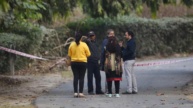 Visitors speak to a guard on duty outside a cordoned off area inside the Delhi zoo. (Virendra Singh Gosain/HT PHOTO) Visitors speak to a guard on duty outside a cordoned off area inside the Delhi zoo. (Virendra Singh Gosain/HT PHOTO)