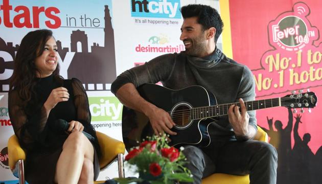Aditya Roy Kapur crooned to the track Humma Humma while his co-star Shraddha Kapoor joined him. (amal ks/ht photo) 