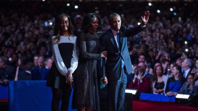US President Barack Obama, first lady Michelle Obama and daughter Malia Obama wave goodbye to supporters after Obama's farewell address at McCormick Place in Chicago, Illinois, on Wednesday.(AFP) US President Barack Obama, first lady Michelle Obama and daughter Malia Obama wave goodbye to supporters after Obama's farewell address at McCormick Place in Chicago, Illinois, on Wednesday.(AFP)
