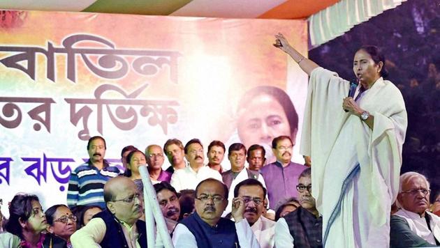 TMC supremo and West Bengal chief minister Mamata Banerjee addresses TMC in front of the main gate of RBI during the 3rd day of their protest dharna against the Centre's demonetisation move, in Kolkata. (PTI Photo) TMC supremo and West Bengal chief minister Mamata Banerjee addresses TMC in front of the main gate of RBI during the 3rd day of their protest dharna against the Centre's demonetisation move, in Kolkata. (PTI Photo)