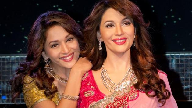 Madhuri Dixit with her statue. (Facebook/Madame Tussauds) Madhuri Dixit with her statue. (Facebook/Madame Tussauds)