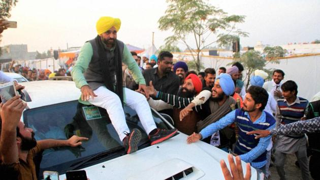 AAP MP Bhagwant Mann during a party rally at village Kolianwali in Lambi, Muktsar. (PTI) AAP MP Bhagwant Mann during a party rally at village Kolianwali in Lambi, Muktsar. (PTI)