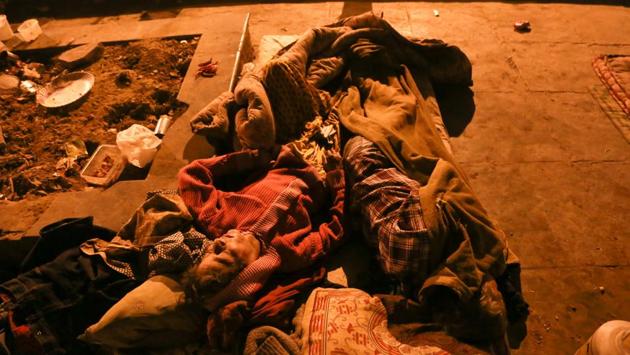 DEFENCELESS: This old woman sleeps on a footpath in Vasant Vihar. (AMAL KS/HT PHOTO) 