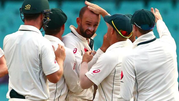 Australia spinner Nathan Lyon (centre) believes his team will have to ‘play ugly’ if they are to surmount India in spin-friendly conditions in the Test series to be played in February-March.(REUTERS)