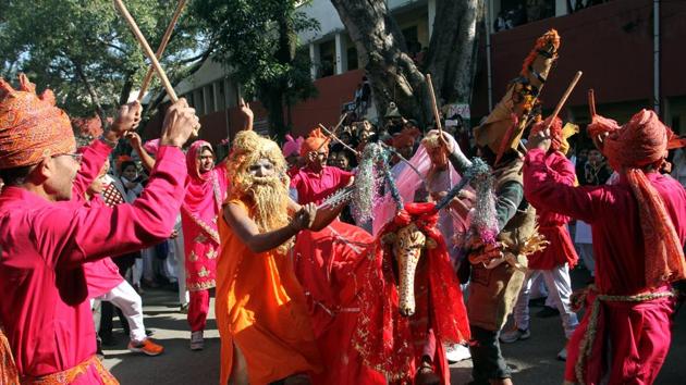 Artists dance during Lohri celebration at Government College for Women Parade in Jammu on Thursday. (Nitin Kanotra/HT Photo )