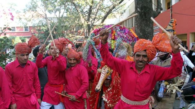 Artists dance during celebrations in Jammu on Thursday. (Nitin Kanotra/HT Photo )