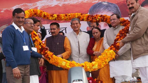 Chief minister Harish Rawat and Congress leaders at a Congress booth workers’ convention in Haldwani. (HT Photo) Chief minister Harish Rawat and Congress leaders at a Congress booth workers’ convention in Haldwani. (HT Photo)