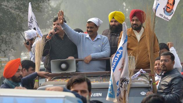Aam Aadmi Party leader and Delhi Chief Minister Arvind Kejriwal during a roadshow near the village Boparai, about 25 kms from Amritsar. For the rookie party, it’s a make-or-break election after it pulled off a stunner in 2014 polls, picking all of its four Lok Sabha seats from Punjab and garnering a 25 per cent vote share.(AFP)