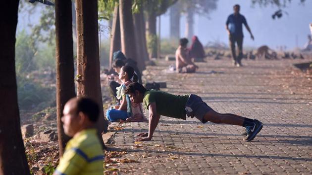 People excercise at Aarey Colony. (Pratham Gokhale/HT PHOTO)
