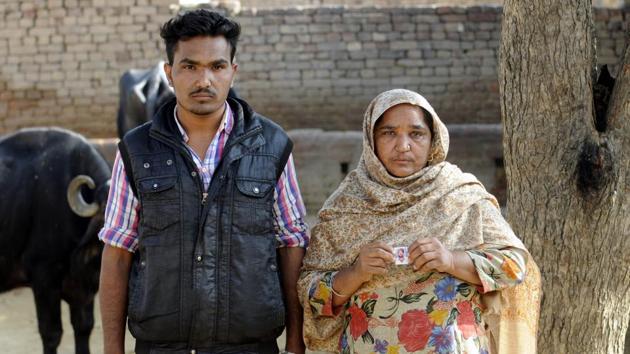 Gurpreet Singh and his mother at their home in Hamirgarh village. Gurpreet’s father killed himself. He had a debt of Rs 4.5 lakh.(Bharat Bhushan/HT Photo)