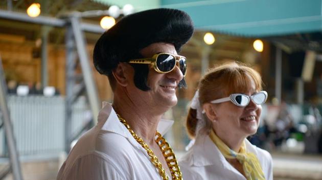 Elvis fans arrive at Central station to board a train to take them to The Parkes Elvis Festival from Sydney. The Parkes Elvis Festival is an annual event celebrating the music and life of Elvis Presley in the New South Wales town of Parkes. (AFP) Elvis fans arrive at Central station to board a train to take them to The Parkes Elvis Festival from Sydney. The Parkes Elvis Festival is an annual event celebrating the music and life of Elvis Presley in the New South Wales town of Parkes. (AFP)