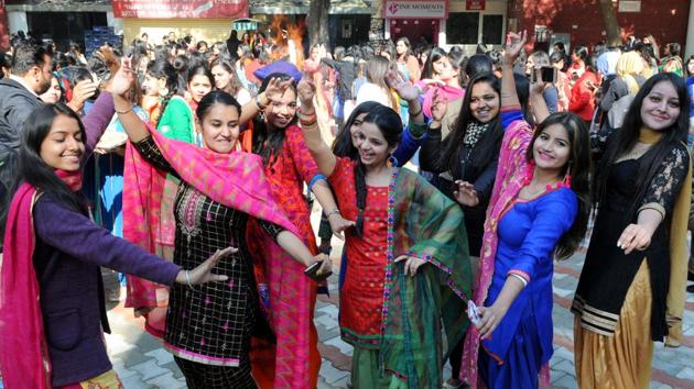 Girls celebrating Lohri festival at MCM College, Sector 36 in Chandigarh on Friday. (Anil Dayal/HT Photo)