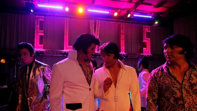 Elvis Presley tribute artists gather on stage during a competition at the 25th annual Parkes Elvis Festival. (REUTERS) Elvis Presley tribute artists gather on stage during a competition at the 25th annual Parkes Elvis Festival. (REUTERS)