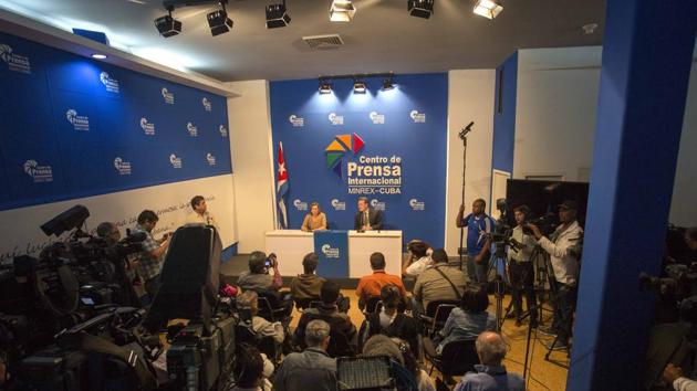 Josefina Vidal (top left), Cuba's director-general of US affairs and Gustavo Machin, vice-director general of the US division of Cuba's foreign ministry, meet with reporters in Havana after President Barack Obama announced he is ending the immigration policy that allows any Cuban who makes it to US soil to stay and become a legal resident. (AP Photo) Josefina Vidal (top left), Cuba's director-general of US affairs and Gustavo Machin, vice-director general of the US division of Cuba's foreign ministry, meet with reporters in Havana after President Barack Obama announced he is ending the immigration policy that allows any Cuban who makes it to US soil to stay and become a legal resident. (AP Photo)